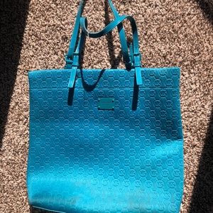 Michael Kors teal purse.